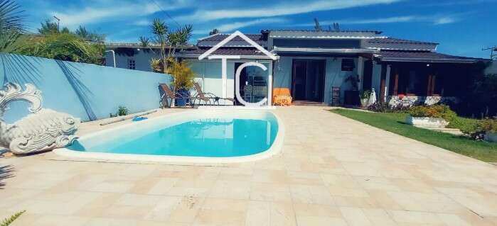 Casa à venda em Capão da Canoa, Capão Novo, com 2 quartos, 120,00m² - Terezinha Capra - Corretora de Imóveis