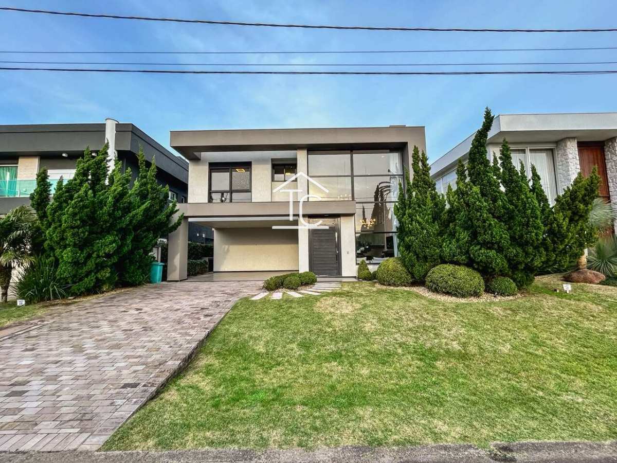 Sobrado à venda em Xangri-Lá, com 5 quartos, 449,31m² - Terezinha Capra - Corretora de Imóveis